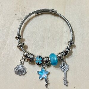 Silver Charm Bracelet with Blue Accents